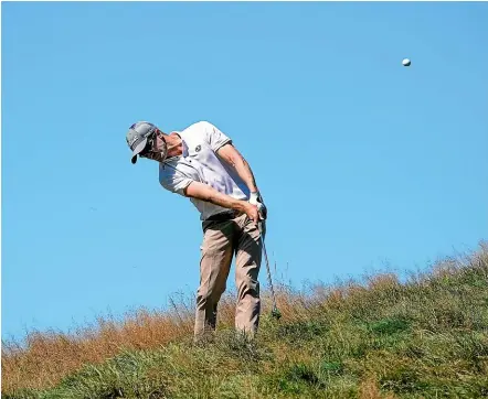  ?? PHOTOSPORT ?? New Zealand’s Harry Bateman in action yesterday during his round of 67.
