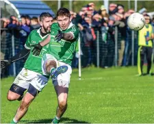  ??  ?? Tommy Stenson and Craig Gallagher defend the Curry goal.