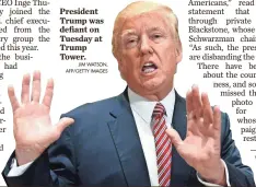  ?? JIM WATSON, AFP/GETTY IMAGES ?? President Trump was defiant on Tuesday at Trump Tower.