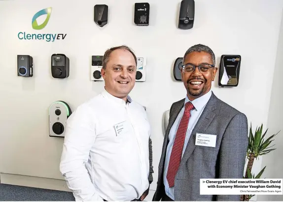  ?? Chris Fairweathe­r/Huw Evans Agen ?? Clenergy EV chief executive William David with Economy Minister Vaughan Gething