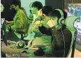  ?? CHANG W. LEE/THE NEW YORK TIMES ?? Students competing in a video game tournament at the E-Sports High School, Japan’s first e-sports high school.