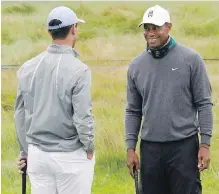  ??  ?? Tiger Woods and Billy Horschel share a laugh during practice at TPC Harding Park in San Francisco on Tuesday.