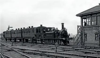  ??  ?? LBSCR 'A1'0-6-0T No. 70 Poplar stands at Seldon Road North Signal box with the local train to Woodside in the 1890s. The loco would move to the KESR in 1901 as No. 3 Bodiam. RAIL ARCHIVE STEPHENSON