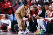  ?? NEIL REDMOND - THE ASSOCIATED PRESS ?? South Carolina head coach Dawn Staley talks to center Kamilla Cardoso as she sits on the bench during the first half against North Carolina on Sunday.