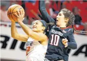  ?? [PHOTO BY BRYAN TERRY, THE OKLAHOMAN] ?? Oklahoma State senior graduate transfer Loryn Goodwin, left, will be making her first appearance at the NCAA Tournament when the ninth-seeded Cowgirls take on No. 8 seed Syracuse at 2:30 p.m. Saturday.