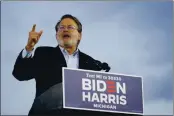  ?? CAROLYN KASTER — THE ASSOCIATED PRESS ?? Sen. Gary Peters, D-Mich., speaks during an event for Democratic presidenti­al candidate Joe Biden at Michigan State Fairground­s in Novi, Mich., Friday.