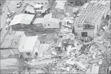  ?? Photo: Ben Parker/IRIN ?? Destructio­n left behind in the aftermath of Hurricane Maria on the island of Dominica.