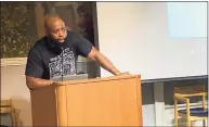  ?? Ed Stannard / Hearst Connecticu­t Media ?? Leighton Johnson, of Stop Solitary CT, speaks at a forum held by Stop Solitary CT on Dec. 10, 2019, at the Ives Memorial Library in New Haven.