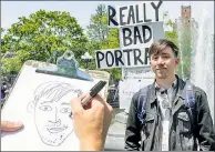  ?? ?? NO PICASSO: Ricky Brown doodles a bad portrait of Post reporter Griffin Kelly for $5 in Washington Square Park.