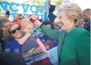  ?? MARY ALTAFFER/ASSOCIATED PRESS ?? Democratic presidenti­al candidate Hillary Clinton greets supporters at an event at Saint Augustine’s University in Raleigh, N.C., on Sunday.