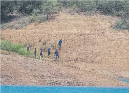  ?? FILIPE AMORIM/AFP ?? El operativo en el embalse duró tres días