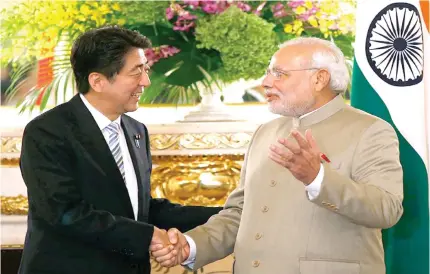  ??  ?? Japan’s Prime Minister Shinzo Abe and Indian counterpar­t Narendra Modi.