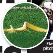  ??  ?? Flas Flashpoint: a banana skin is thrown from the crowd on to the Emirates pitch after Aubameyang’s penalty puts Arsenal 1-0 ahead