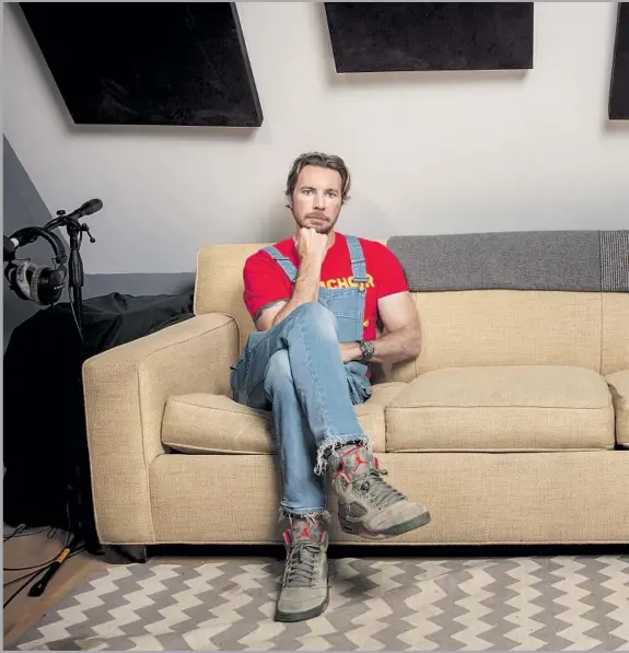  ??  ?? THE COUCH in the attic where “Armchair Expert” is recorded is for anyone who’s not Dax Shepard, but the podcast star (and actor) deigns to vacate his recliner to join co-hoost Monica Padman there. Guests include celebritie­s as well as experts in fields that Shepard is pondering.