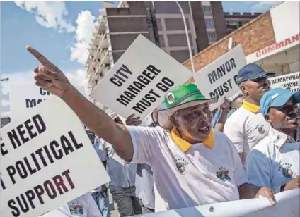  ??  ?? Rough ride: Taxi drivers march to the offices of the Ekurhuleni mayor and the city manager demanding they resign. The industry has dodged procuremen­t processes and allegedly made death threats. Photo: Oupa Nkosi
