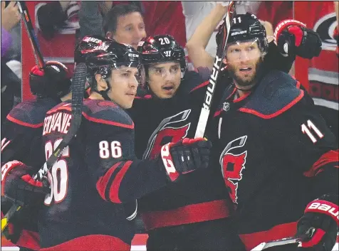  ?? GETTY IMAGES ?? Hurricanes’ Sebastian Aho celebrates after scoring against the Islanders in Game 4 of their series in Raleigh Friday night. The Hurricanes swept the Islanders and are moving on to the Eastern Conference final.