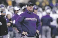  ?? AP PHOTO/CARLOS OSORIO ?? Northweste­rn head coach Pat Fitzgerald stands on the sideline during the first half of an NCAA college football game against Michigan on Oct. 23, 2021, in Ann Arbor, Mich.