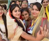 ?? — PTI ?? Students pose for a selfie during ‘ Spandan,’ an inter- faculty cultural festival of Banaras Hindu University, in Varanasi on Tuesday.