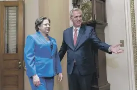  ?? ALEX BRANDON/AP ?? Rep. Jennifer McClellan, D-Va., is joined by House Speaker Kevin McCarthy of California for a ceremonial swearing-in on Capitol Hill last Tuesday.