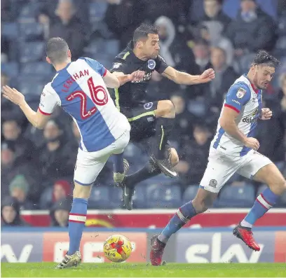  ??  ?? Brighton’s Sam Baldock battles for the ball with Blackburn Rovers’ Darragh Lenihan