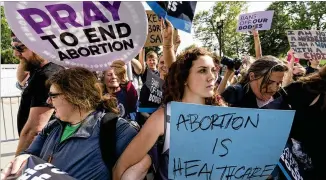  ?? ALEX BRANDON/AP ?? Data from the General Social Survey revealed 76% of Americans who were morally opposed to abortion would give “emotional support” to a friend or family member who decided to have one. Another 43% would help make arrangemen­ts, 28% would pay associated costs and 6% would pay for the abortion.