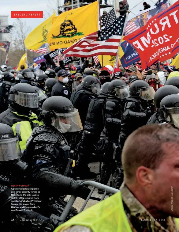  ??  ?? READY FOR WAR
Agitators clash with police and other security forces as they storm the U.S. Capitol shortly after remarks from speakers including President Trump, his lawyer Rudy Giuliani and the president’s son Donald Trump Jr.
