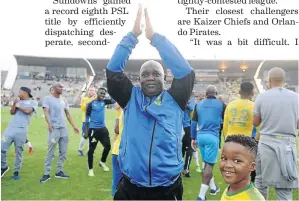  ?? /LEFTY SHIVAMBU/GALLO IMAGES ?? Pitso Mosimane celebrates with his players and supporters at Lucas Moripe Stadium in Pretoria.