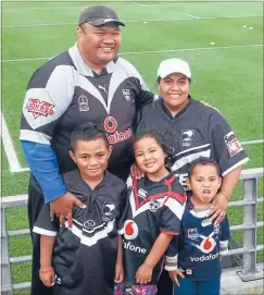  ??  ?? Roy and Rachel with their children, from left, Matthias, 8, Genesis, 7, and Corban, 5, at a Warriors game together.