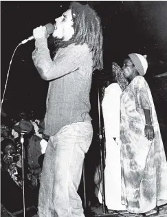  ??  ?? Bob Marley and The I-Threes performing.