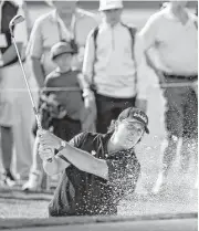  ?? Jay Calderon / The Desert Sun via Associated Press ?? Phil Mickelson hits out of a bunker on the 15th hole during the first round of the CareerBuil­der Challenge at La Quinta, Calif., on Thursday.