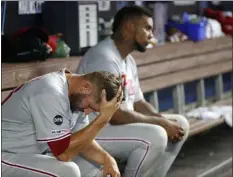  ?? WILFREDO LEE — THE ASSOCIATED PRESS FILE ?? Phillies reliever Juan Nicasio, shown at right next to fellow reliever Adam Morgan in a typically torturous moment for the relief corps June 29, is expected to be activated off the injured list Tuesday.