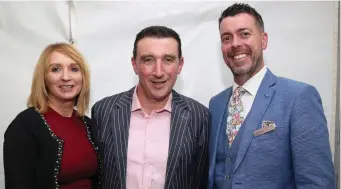  ??  ?? After-sales Manager Gwen Linehan and Sales Manager Darren Ronan chatting to Paschal Sheehy (centre) at the official opening party at Cavanaghs of Mallow.
