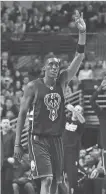  ?? PATRICK GORSKI / USA TODAY SPORTS ?? Tony Snell celebrates in the victory over the Bulls on Dec. 31.