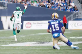  ?? JOHN WOODS/THE CANADIAN PRESS ?? Saskatchew­an’s Willie Jefferson intercepte­d Winnipeg QB Matt Nichols and scored in a Sept. 8 meeting. They meet again Sunday in the West semifinal.