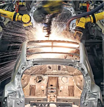  ??  ?? A car under constructi­on at Nissan’s Sunderland plant. The company shrugged off Brexit uncertaint­y and committed to making its next Qashqai and X-trail models at the factory