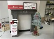  ?? LAURA CATALANO — FOR DIGITAL FIRST MEDIA ?? Hammer &amp; Stain in North Coventry is giving potential crafters a DIY experience — creating home decoration­s out of wood. Shown here are some examples of the seasonal items that can be made.