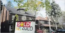  ?? THE CANADIAN PRESS FILE PHOTO ?? The Ontario Real Estate Associatio­n is calling for less-stringent mortgage rules in a rebuttal aimed at the head of the Canada Mortgage and Housing Corp.