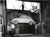  ?? ?? A Volkswagen Beetle arrives at Pier 61 of the U.S. Lines in Manhattan in 1956. Volkswagen is trying to tap nostalgia for its past successes as it tries to achieve U.S. sales more in line with its stature as the world’s second-largest carmaker.