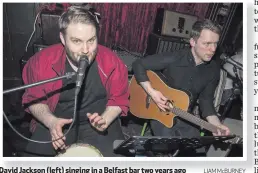  ??  ?? David Jackson (left) singing in a Belfast bar two years ago