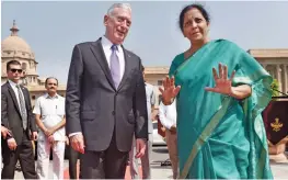  ?? — PTI ?? Defence minister Nirmala Sitharaman welcomes US defence secretary Jim Mattis at South Block in New Delhi on Tuesday.
