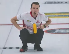  ?? MICHAEL BURNS / CURLING CANADA ?? Team Canada skip Brendan Bottcher admitted to a case “of butterflie­s” during draw one against team Scotland.