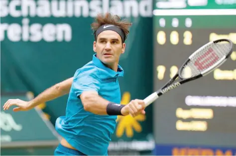  ?? — Reuters ?? Switzerlan­d’s Roger Federer in action during the final against Croatia’s Borna Coric in Halle.