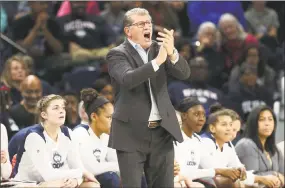  ?? John J. Kim / Chicago Tribune ?? UConn coach Geno Auriemma can pick up his 1,000th career win with a victory over Oklahoma on Tuesday.