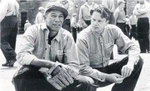  ??  ?? A scene from The Shawshank Redemption, featuring inmates Red (Morgan Freeman), left, and Andy (Tim Robbins).