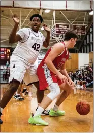  ?? JAMES BEAVER/FOR MEDIANEWS GROUP ?? Abington’s Zyeir Olasewere (42) disagrees with the foul just called on him against Upper Dublin’s Drew Stover (15).