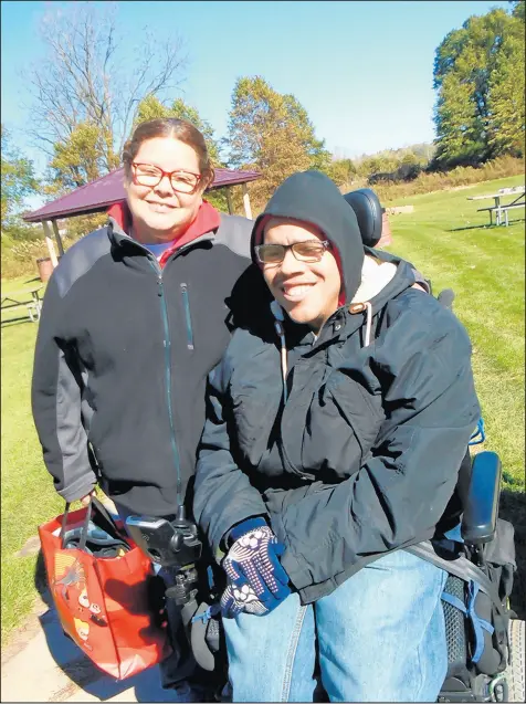  ?? SUE ELLEN ROSS/POST-TRIBUNE ?? Pedro Gonzalez, right, of Griffith, was the first to arrive, with his mother, Hilda Rivera.