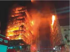  ?? AP ?? Fire guts the abandoned former headquarte­rs of the federal police in Sao Paulo, Brazil.