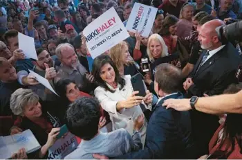  ?? WIN MCNAMEE/GETTY ?? Republican presidenti­al candidate Nikki Haley greets supporters after her first campaign event Wednesday in Charleston, S.C. Haley has plenty of accomplish­ments, including being the first female governor of South Carolina.