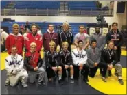  ?? SAM STEWART - DIGITAL FIRST MEDIA ?? District 1-AAA West Champions pose after their selective bouts. Included are: Boyertown’s Matt Wilde (113), David Campbell (120), Jakob Campbell (126), Chris Berry (152) and Elijah Jones (182), Marple Newtown’s Anthony Goodman (285), Methacton’s Bryce...