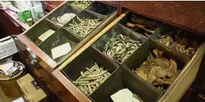  ??  ?? Popular panacea: Herbs used in traditiona­l remedies displayed in a Chinese medicine hall.